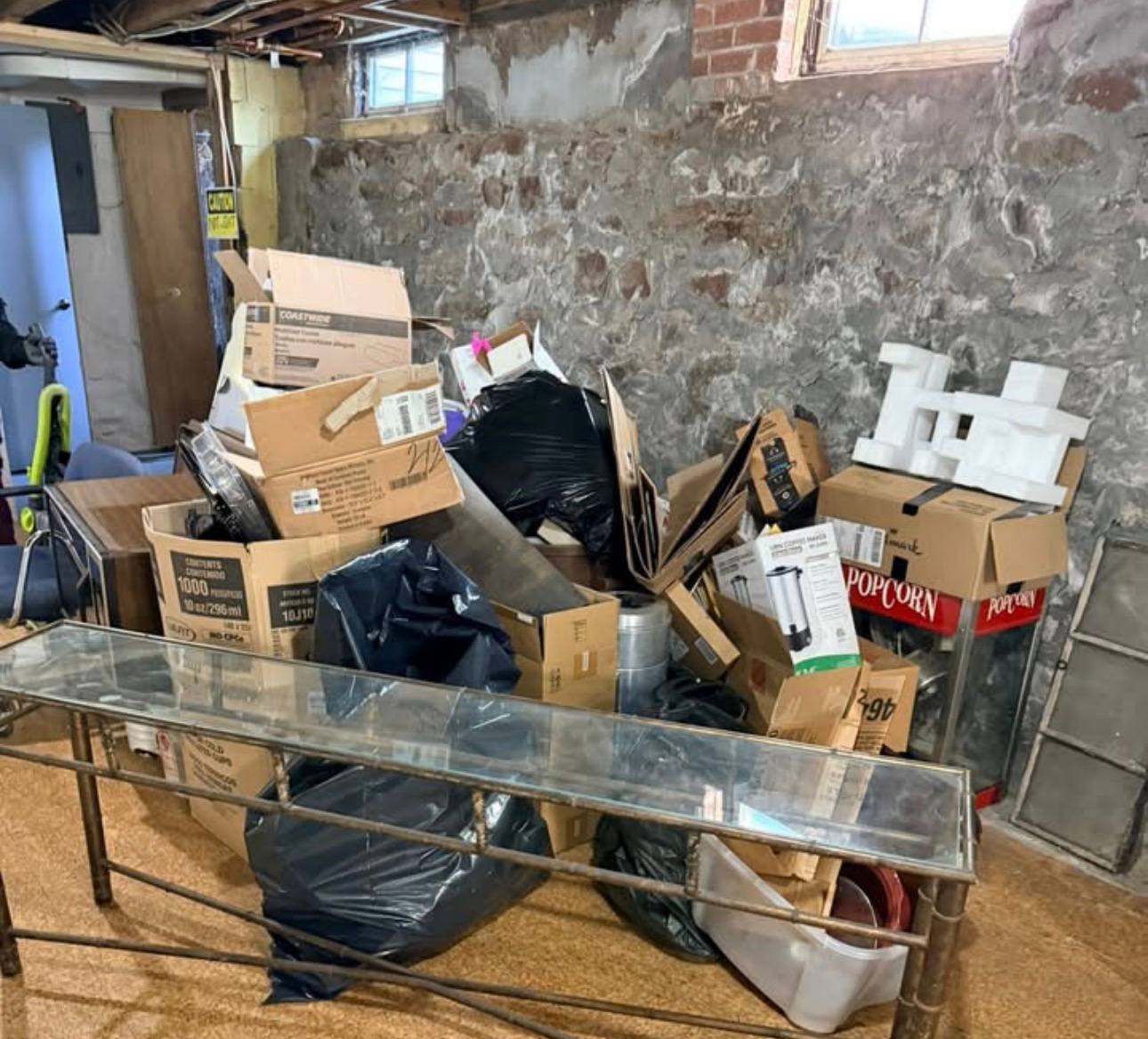 Basement cleanout with boxes staged for removal