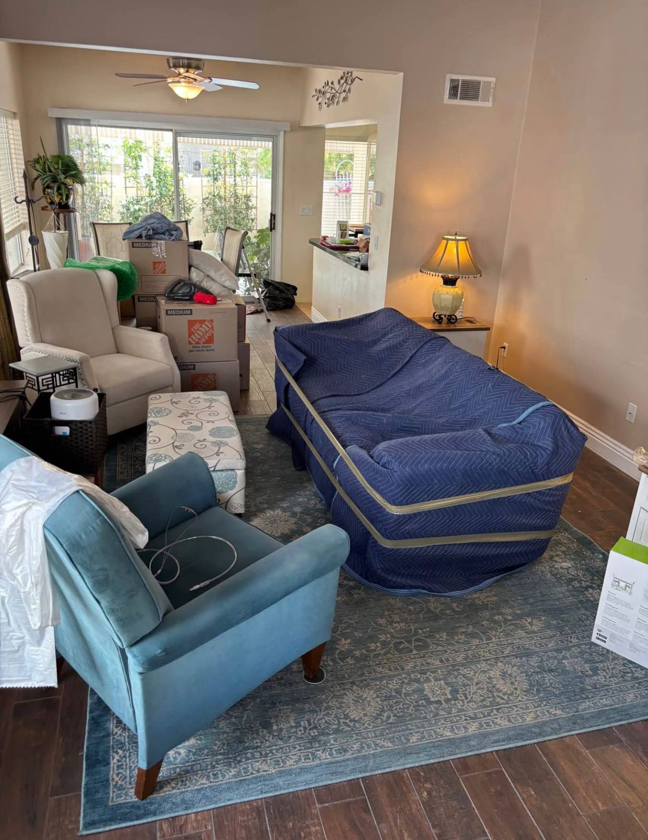 Wrapped sofa staged during a Las Vegas home move